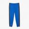 Calça jogger Lacoste masculina com listras e logo Azul - Marca Lacoste