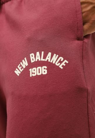 Calça New Balance Jogger Essentials Vinho